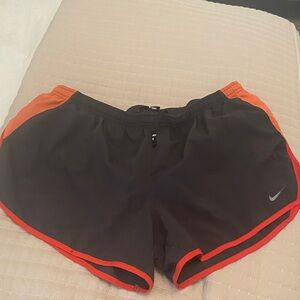Nike Women's Athletic Shorts in Black and Orange